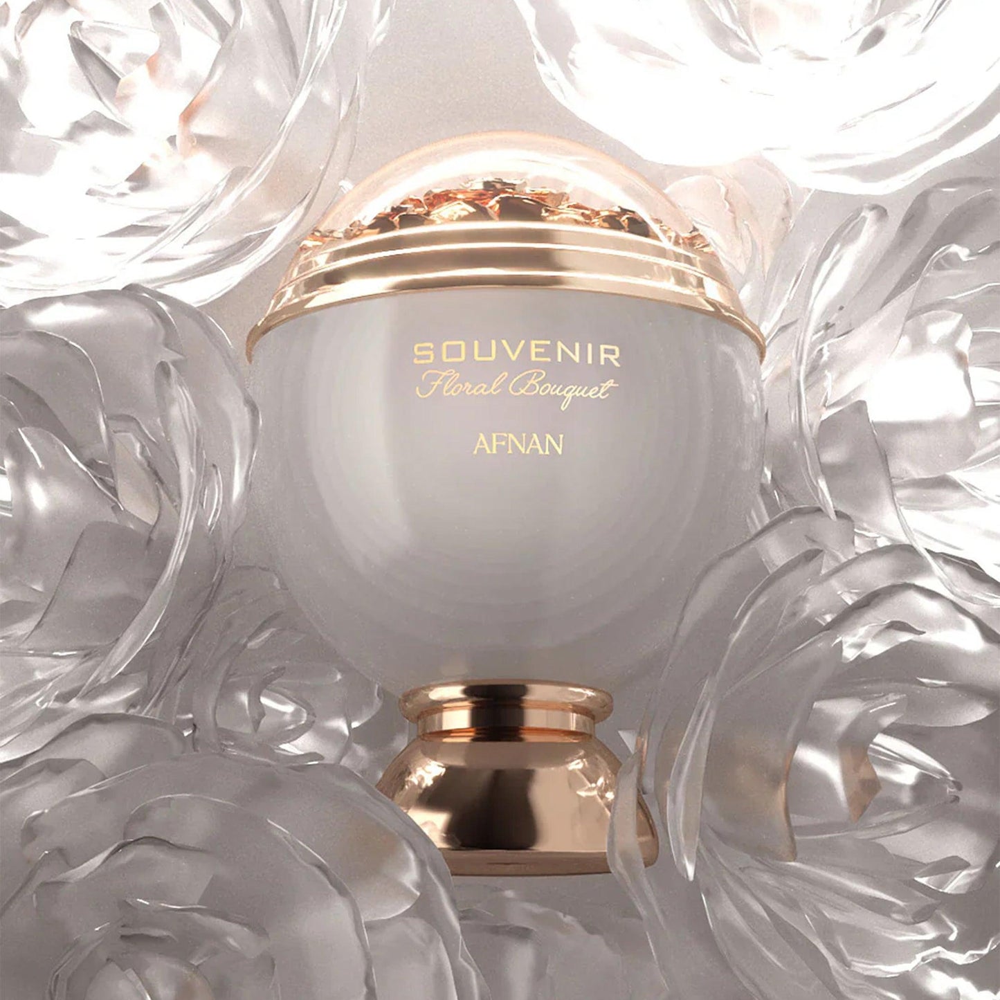 Afnan Souvenir Floral Bouquet Eau De Parfum elegant white and gold spherical bottle surrounded by translucent floral decorations under soft lighting