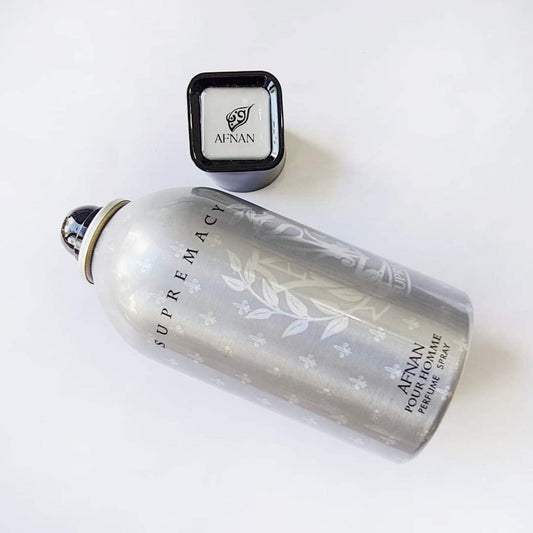 Afnan Supremacy Pour Homme perfume spray bottle on white background.