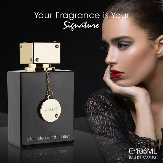 Armaf Club De Nuit Intense Eau De Parfum black and gold bottle placed beside a woman with red lips on a dark background