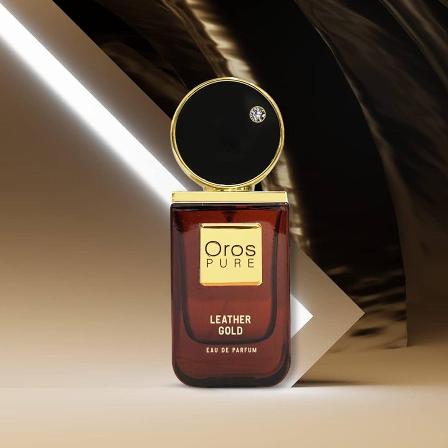 Oros Pure Leather Gold Eau De Parfum bottle in rich brown and gold design displayed on a warm gradient background with elegant lighting