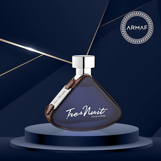 Armaf Tres Nuit Pour Homme perfume bottle on blue background.