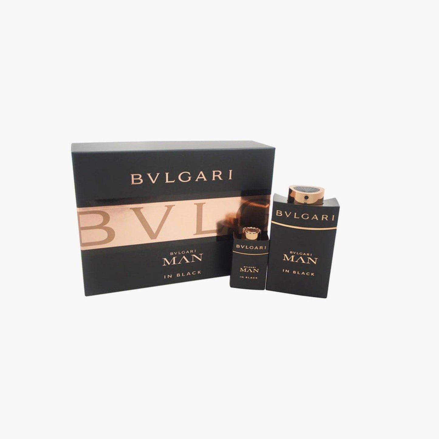 Bvlgari Man In Black gift set featuring two sleek black and gold perfume bottles placed beside a matching black box with copper accents on a white background.
