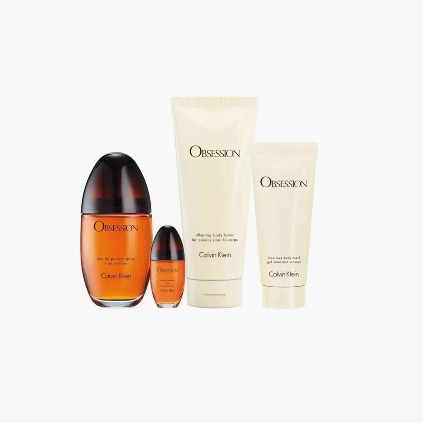 Calvin Klein Obsession For Women gift set featuring Eau De Parfum bottles, body lotion, and body wash arranged on a white background.
