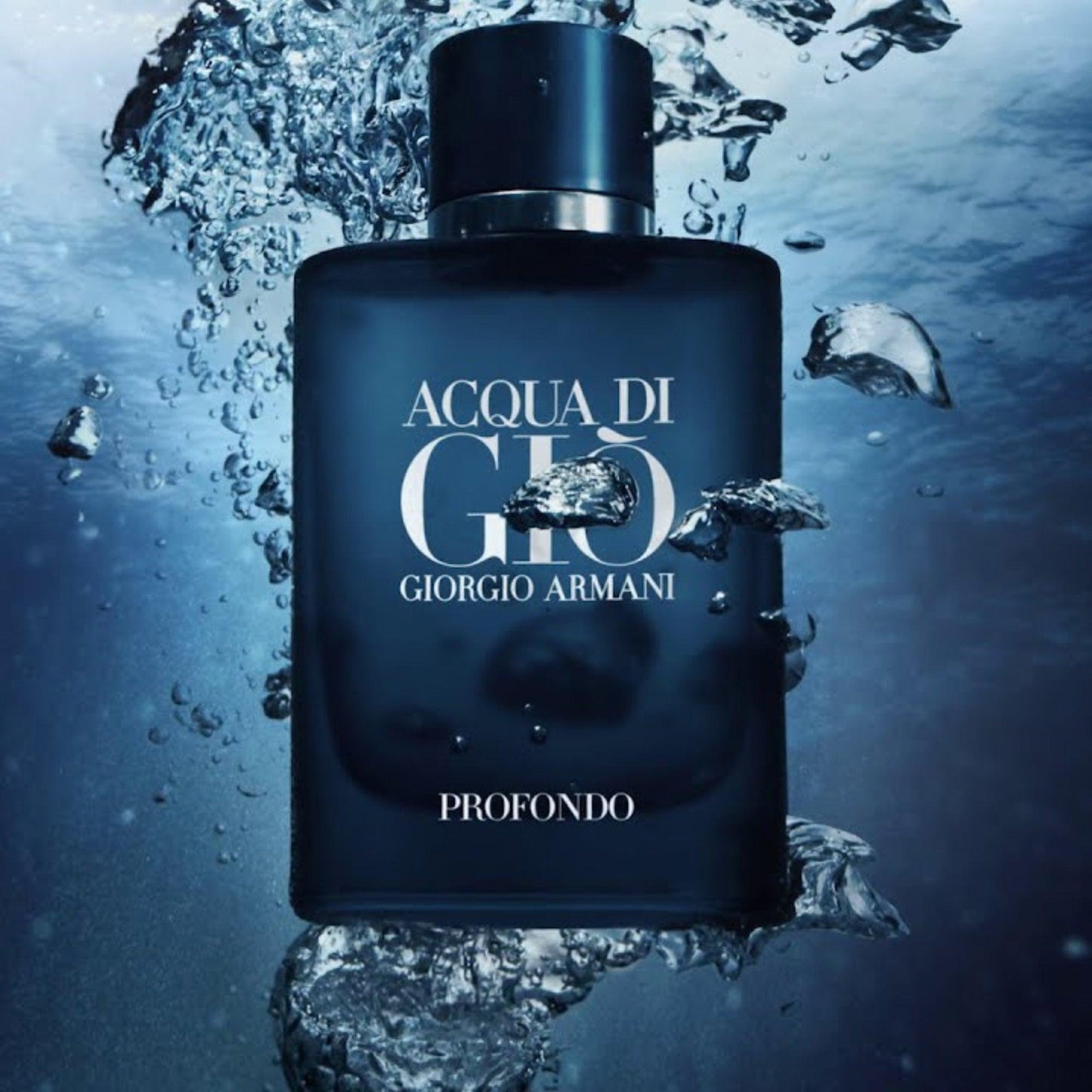 Giorgio Armani Acqua Di Gio Profondo Eau De Parfum navy blue bottle submerged in water with air bubbles creating an aquatic effect