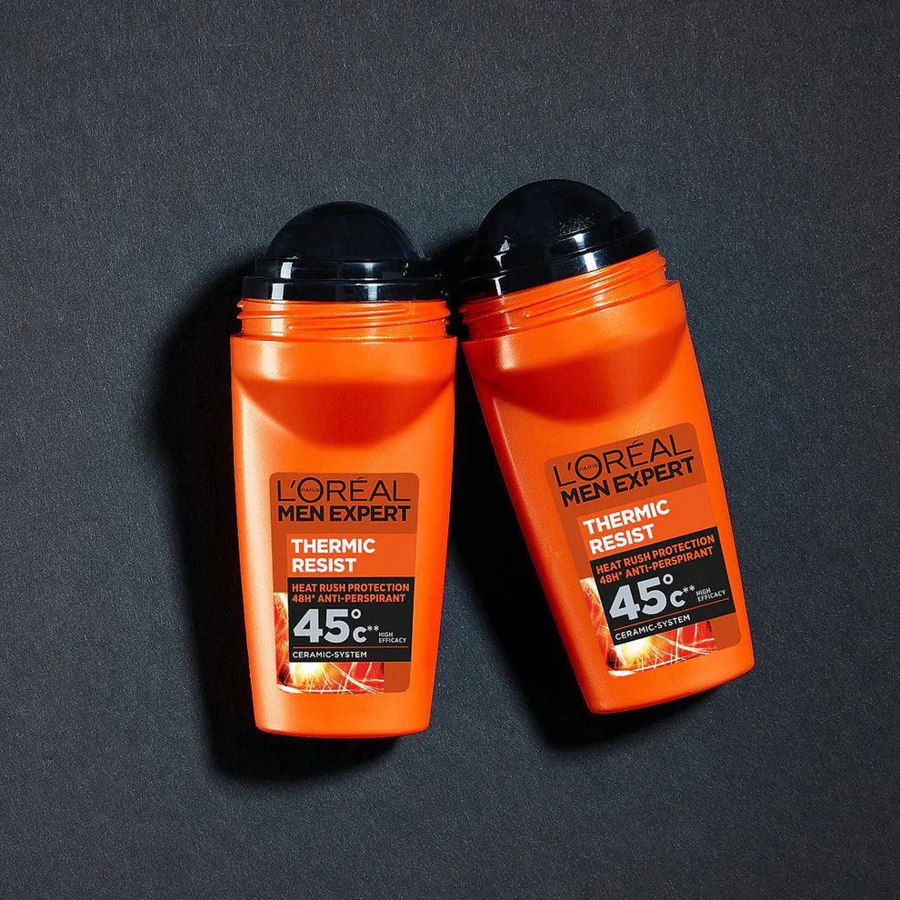 Two LOreal Men Expert Thermic Resist 45°C Heat Protect Anti-Perspirant Deodorant bottles placed side by side on a dark textured background