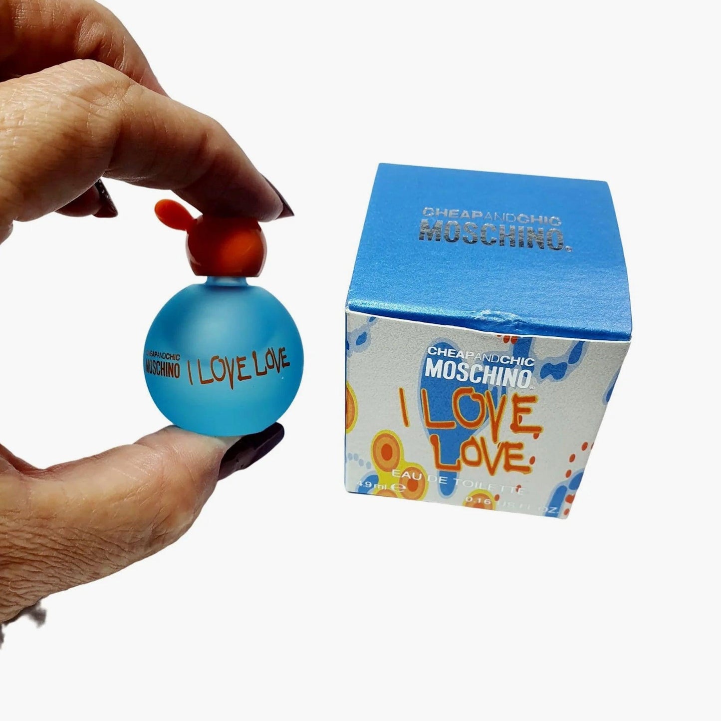 Moschino I Love Love perfume mini bottle with box.