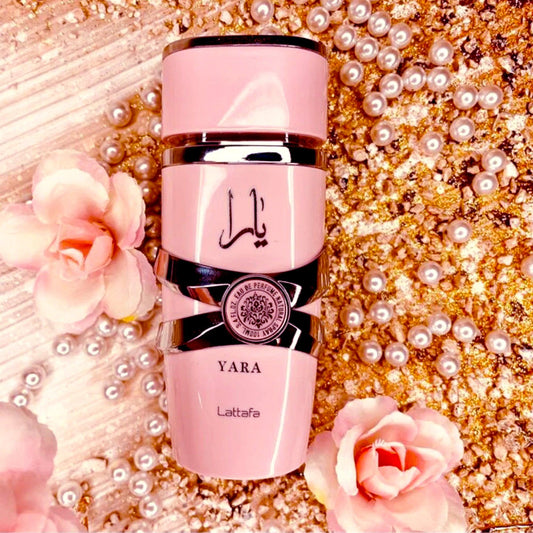 Lattafa Yara perfume bottle with pink roses and pearls.