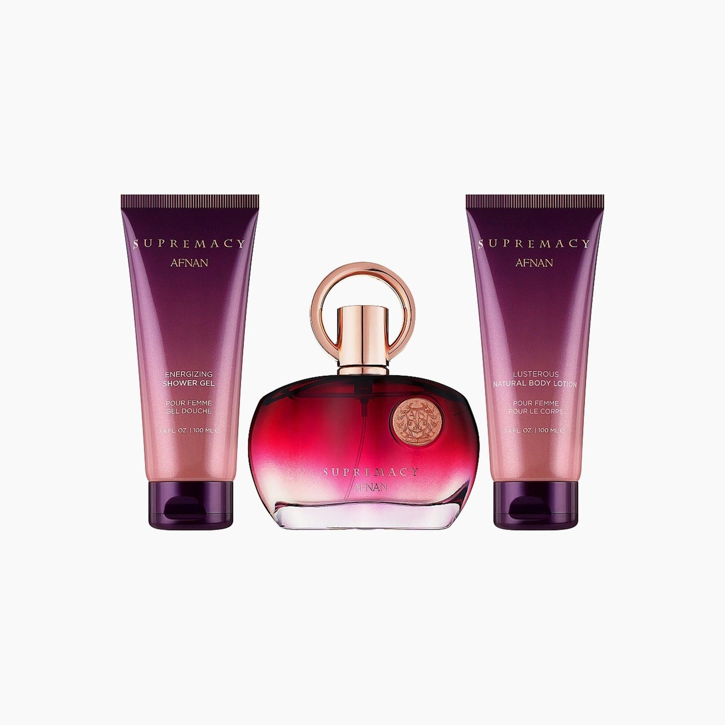 Afnan Supremacy Pour Femme gift set featuring a red and gold perfume bottle with matching shower gel and body lotion, creating an elegant and feminine presentation.