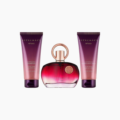 Afnan Supremacy Pour Femme gift set featuring a red and gold perfume bottle with matching shower gel and body lotion, creating an elegant and feminine presentation.