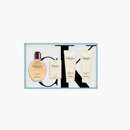 Calvin Klein Obsession For Men gift set featuring Eau De Toilette, aftershave balm, shower gel, and deodorant in a CK-branded box on a white background.