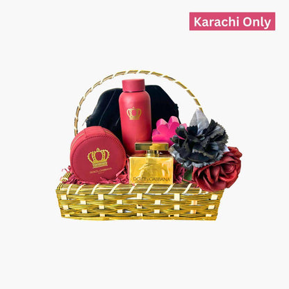 Dolce & Gabbana luxury gift basket with perfume, body lotion, and accessories in red and gold packaging with floral decoration