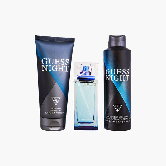 Guess Night fragrance set with Eau De Toilette bottle, shower gel, and deodorizing body spray in blue and black packaging