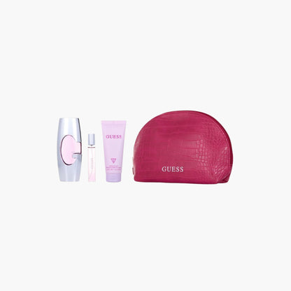 Guess Girl fragrance set with pink Eau De Toilette bottle, rollerball, body lotion, and pink cosmetic pouch