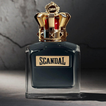 Jean Paul Gaultier Scandal Eau De Parfum with a gold and red crown-shaped cap, displayed against a dark background