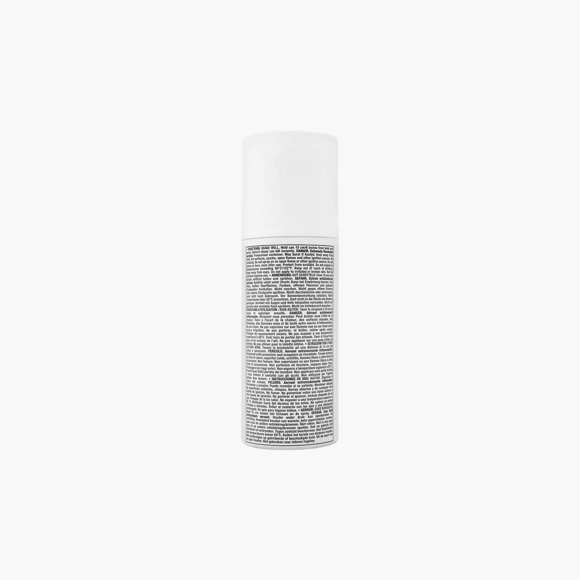 White cylindrical skincare product bottle with black printed text label displayed against a plain white background