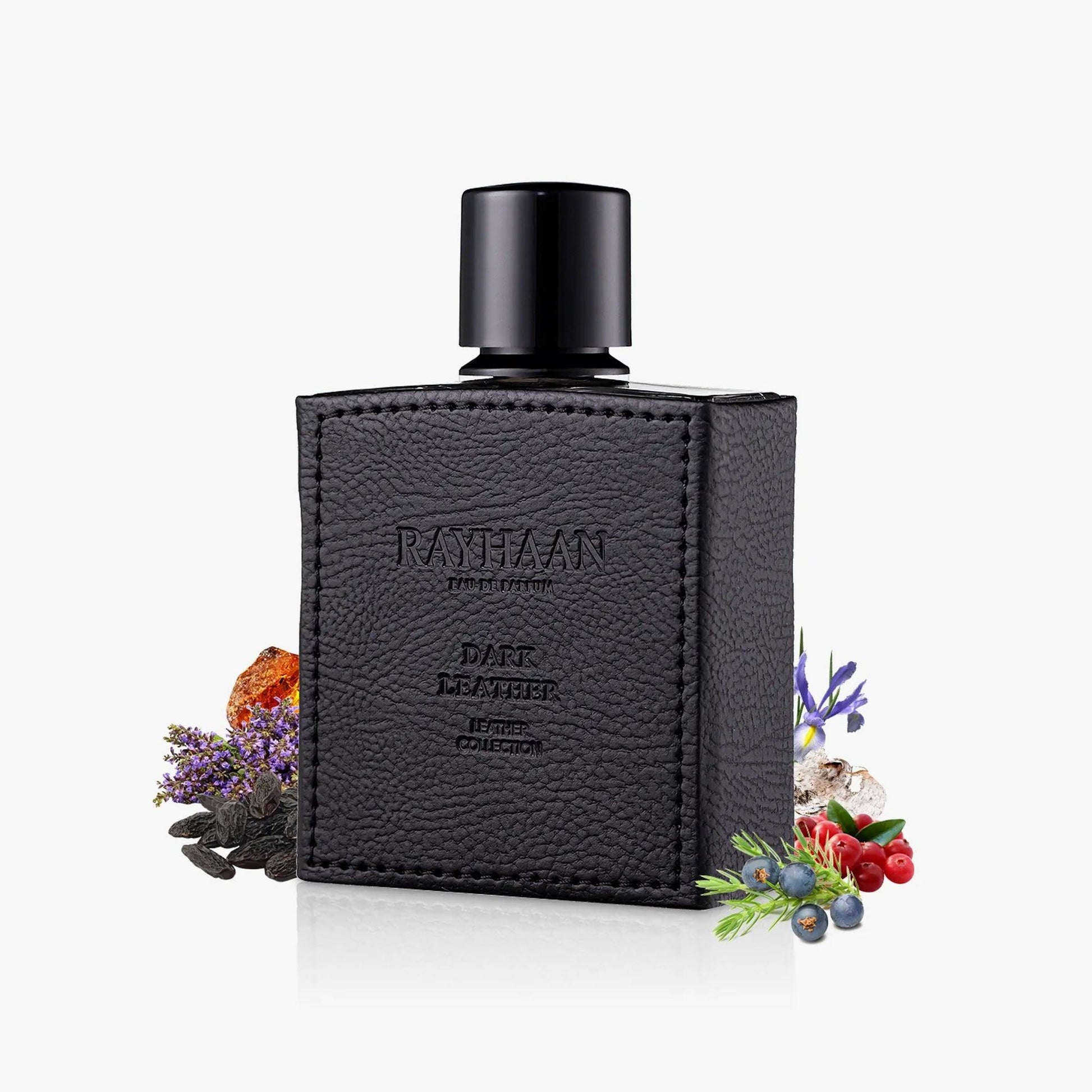 Rayhaan Dark Leather Eau De Parfum bottle with black textured leather design surrounded by berries, amber, lavender, and spice elements on a white background