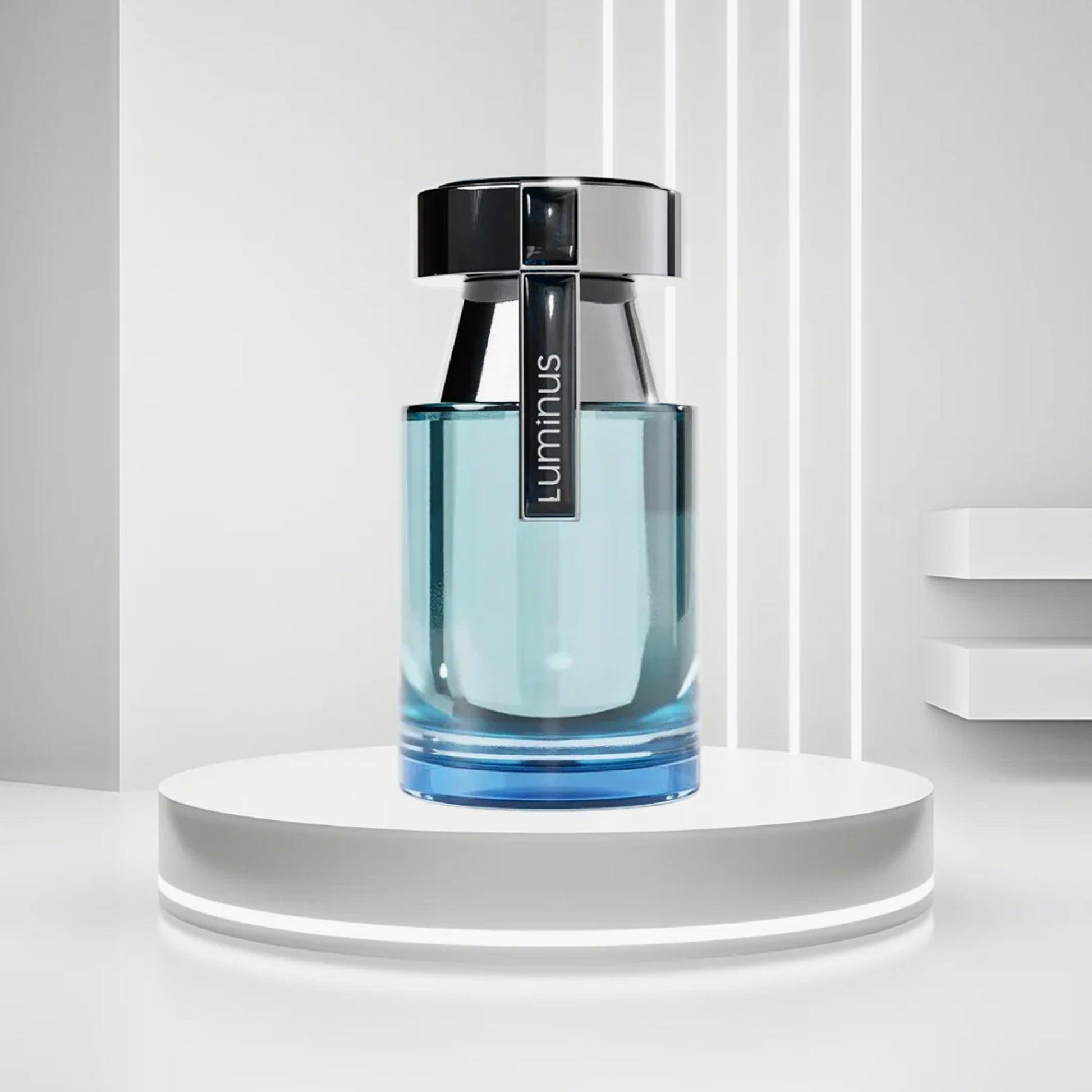 Rue Broca Luminous Eau De Parfum bottle in sleek blue glass design with black cap displayed on a glowing white pedestal background