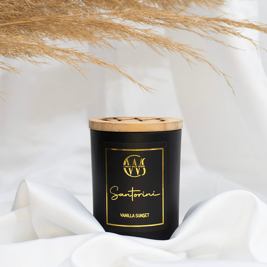 Candle Wick Store Santorini Candle with a Roasted Vanilla Sunset Scent Bottle and Packaging